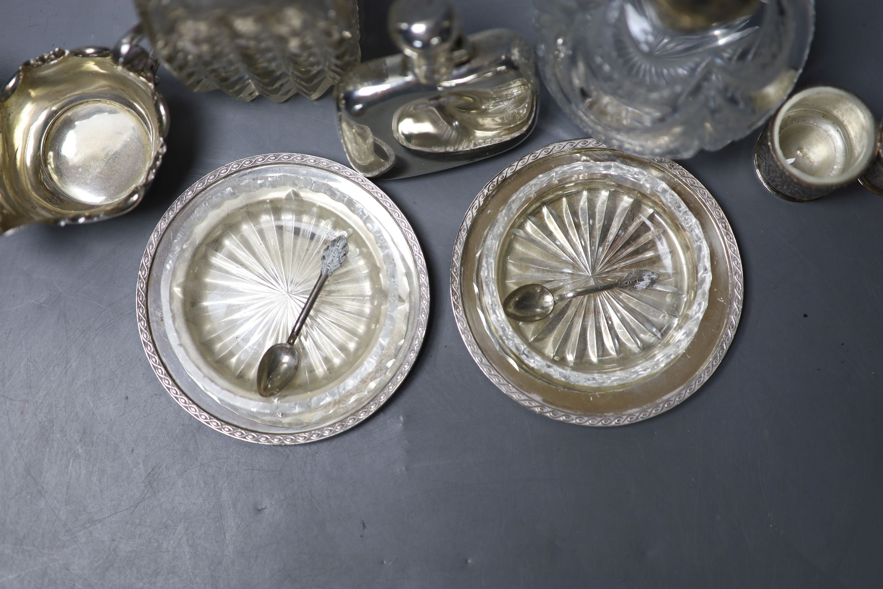 Mixed small silver including pair of silver dishes with glass liners, a silver hip flask, silver cream jug, scent bottles etc.